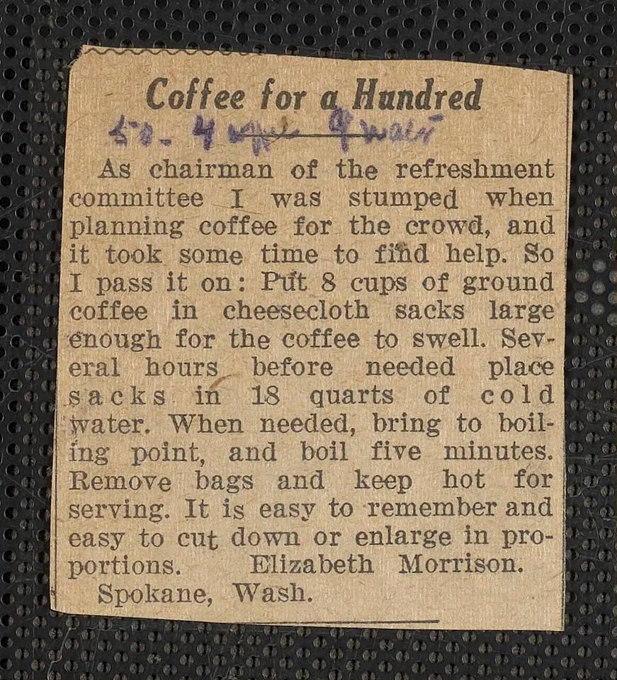 Coffee beside a handwritten activity ledger